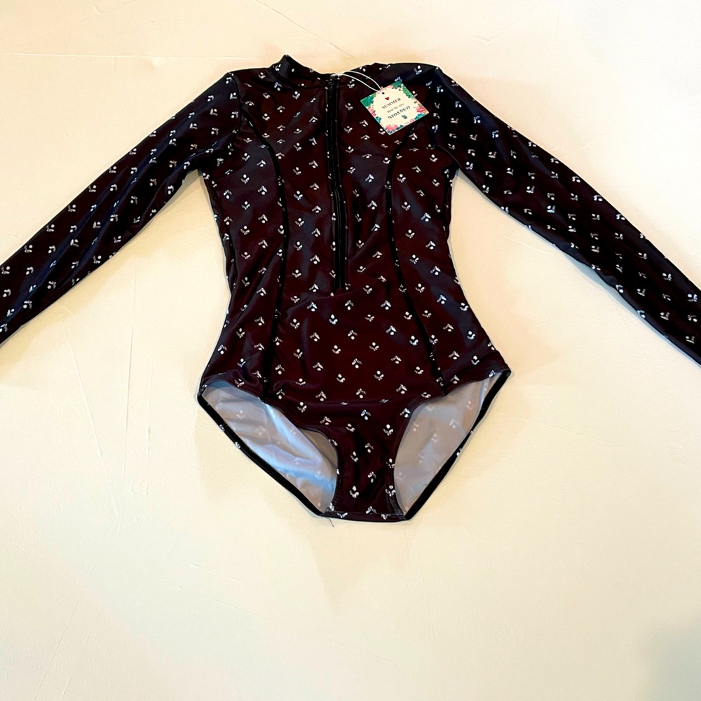 NWT long sleeve swimsuit, black with minimal white accents, front zipper
